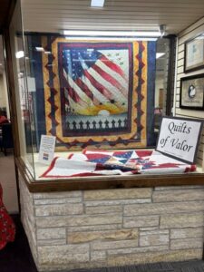 A window display at the Quilts of Valor store.