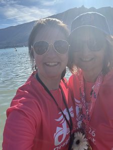 Abbe and Michelle with the water and mountains in the background.