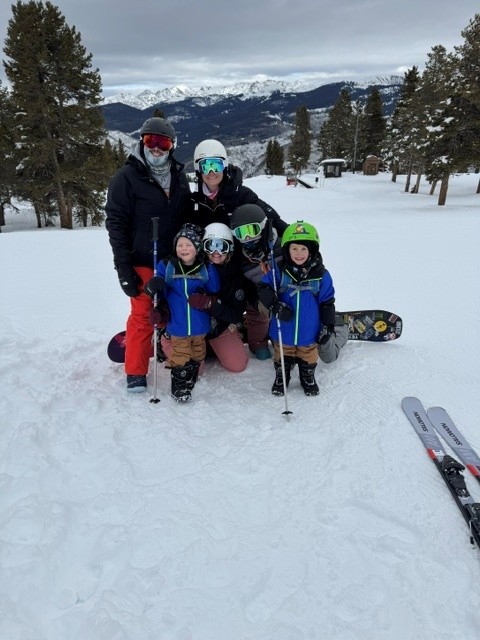 Kim and family snowboarding